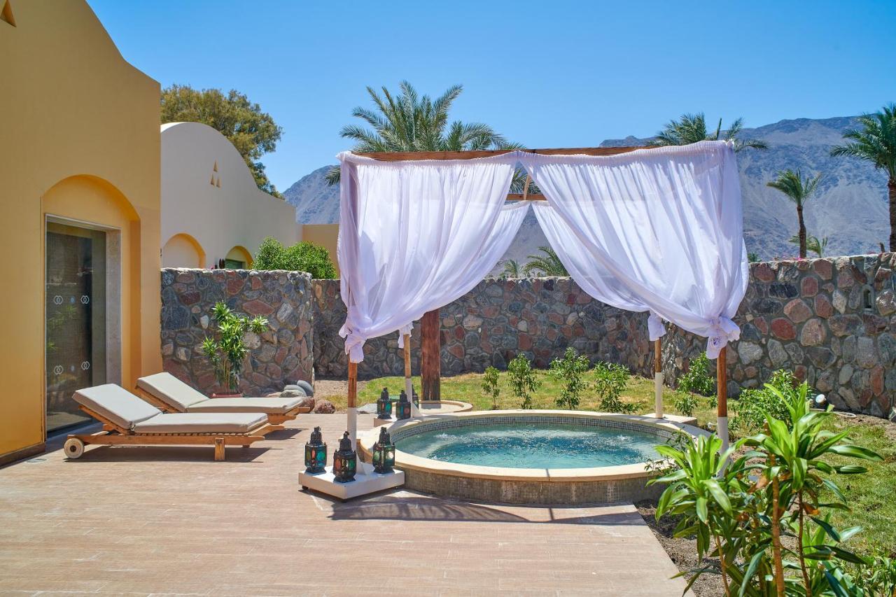 Mosaique Beach Resort Taba Heights Extérieur photo A private pool at a hotel
