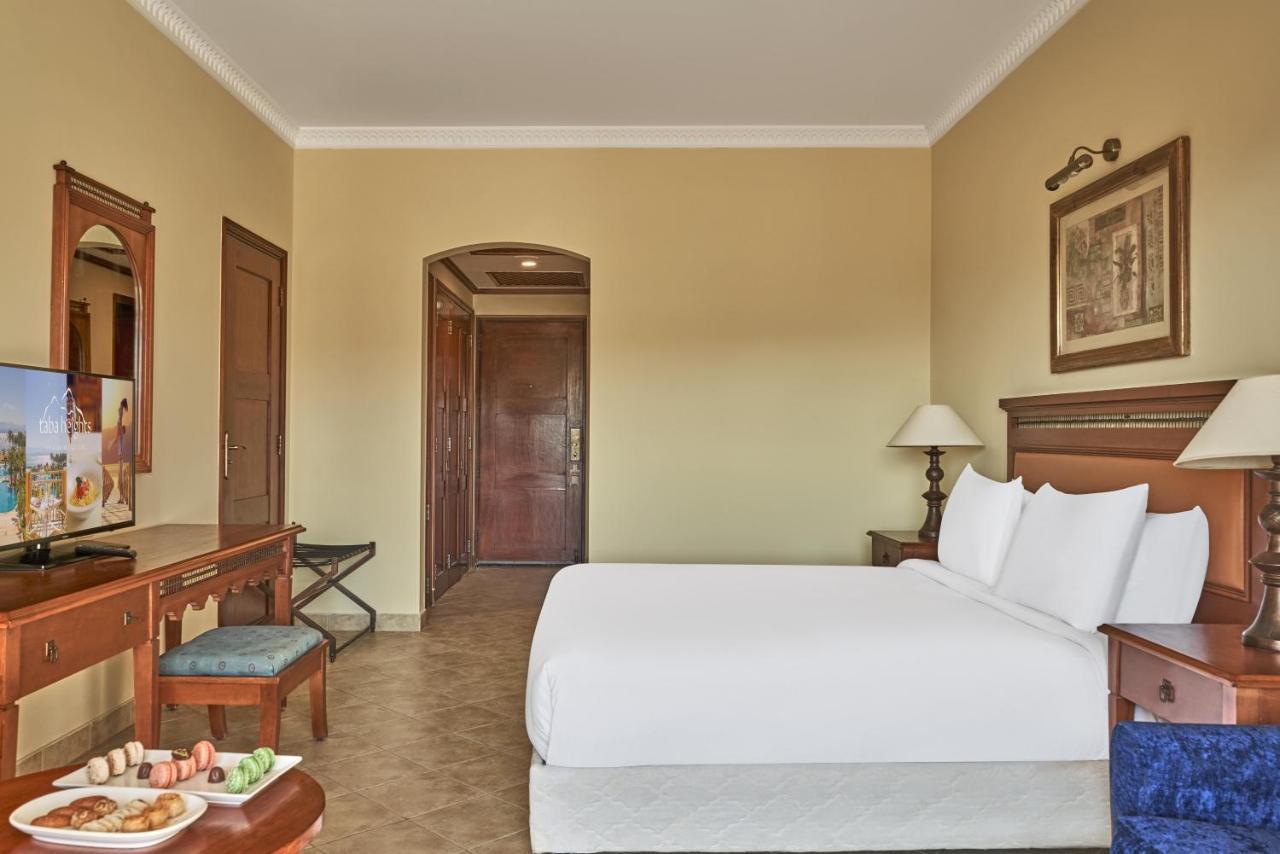 Mosaique Beach Resort Taba Heights Extérieur photo A guest room at the Hilton Luxor