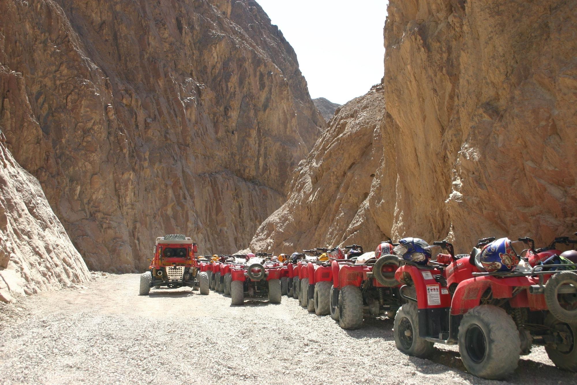 Mosaique Beach Resort Taba Heights Extérieur photo Tourists on quad bikes in Wadi Rum