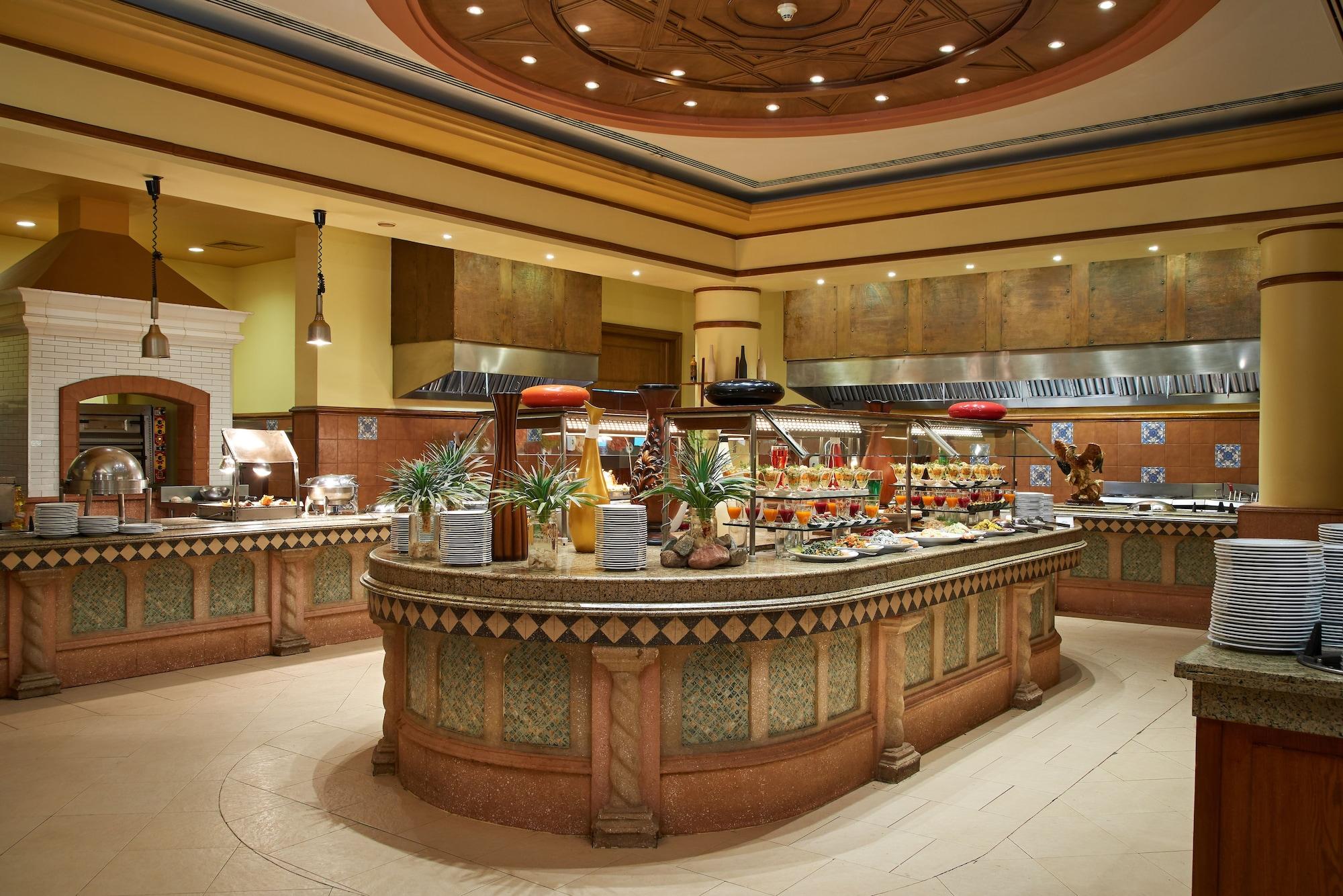 Mosaique Beach Resort Taba Heights Extérieur photo A buffet at a hotel
