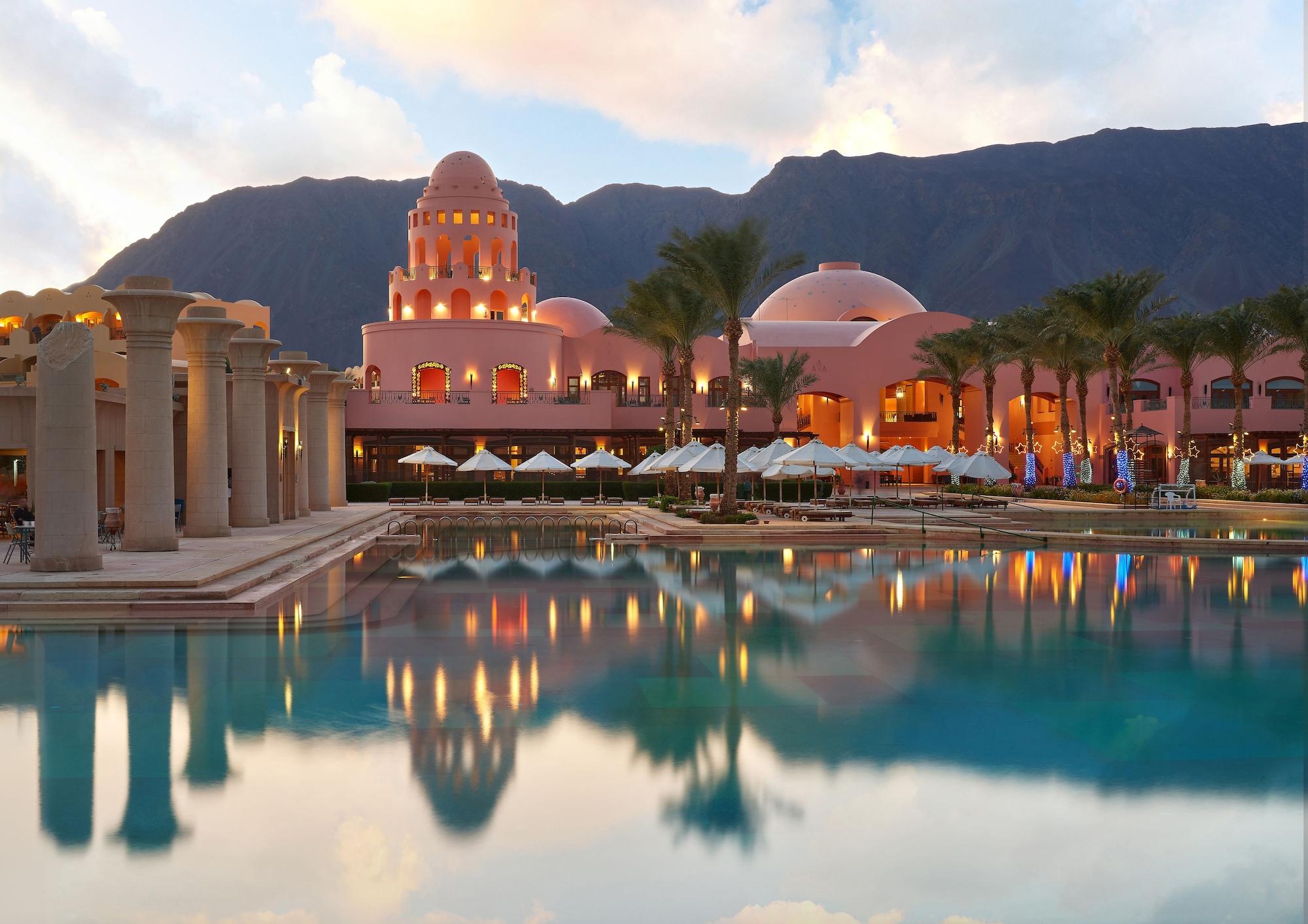 Mosaique Beach Resort Taba Heights Extérieur photo The resort at sunset